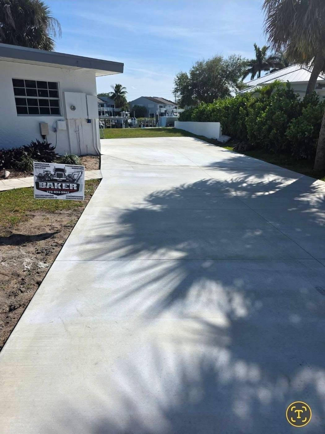 Freshly poured concrete driveway installation